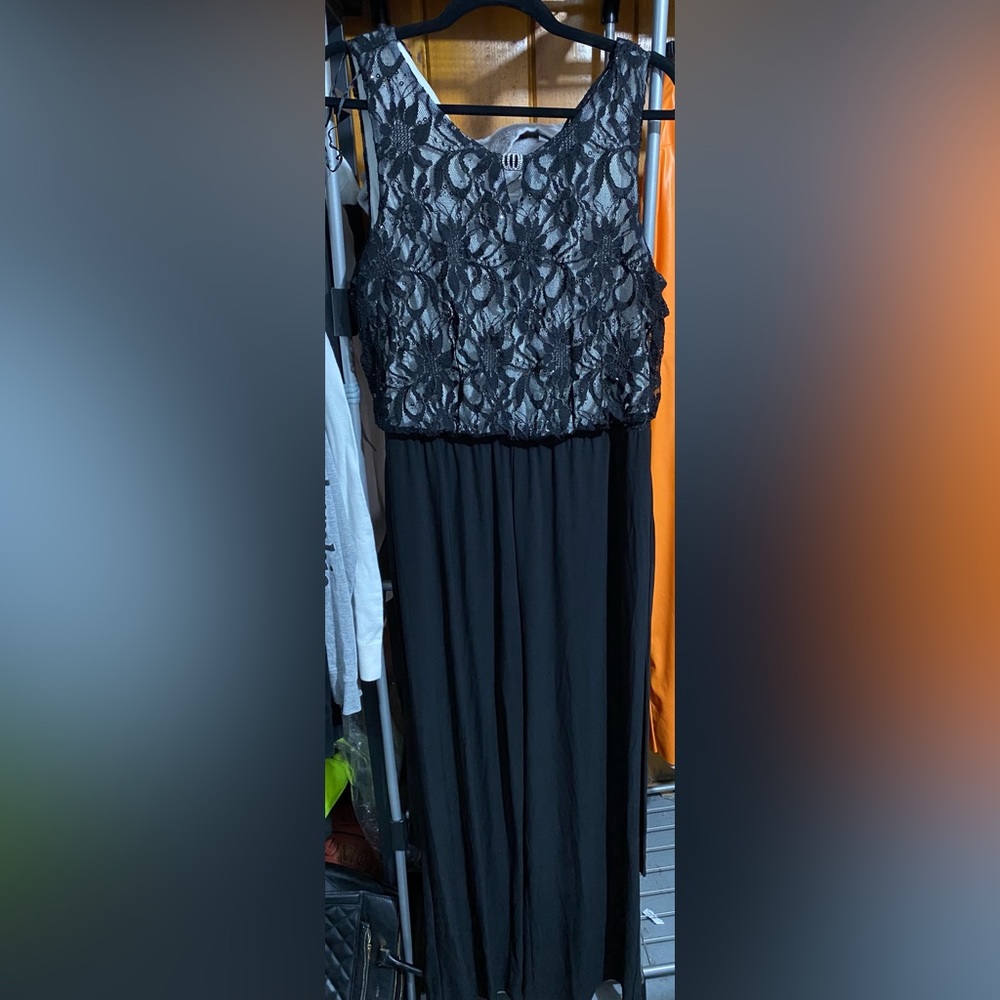 Black one piece jumpsuit.